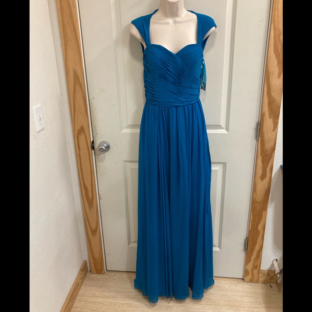 Peacock blue dress with open back